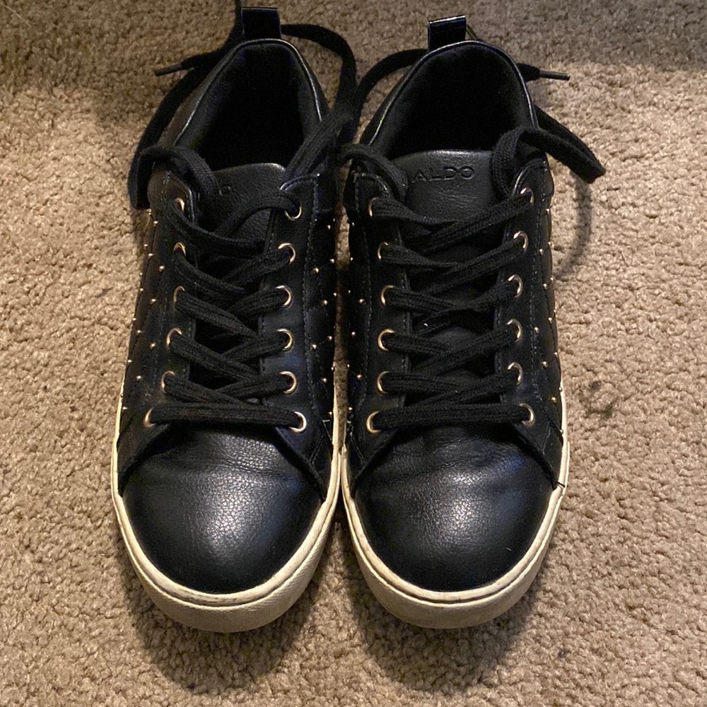 BLACK AND GOLD ALDO SNEAKERS